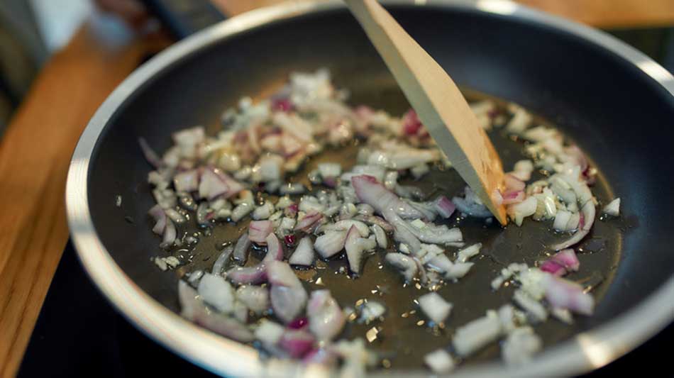 How to prevent onions from burning while cooking