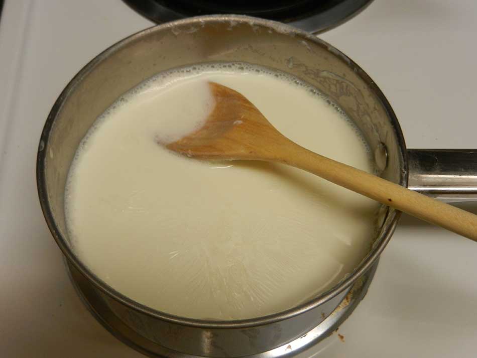 To prevent boiling milk from sticking at the bottom